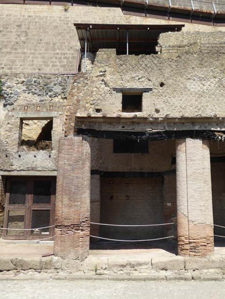 Decumanus Maximus, Herculaneum, July 2015. Building on north side of the Decumanus Maximus, doorway numbered 2, and upper floors. Photo courtesy of Michael Binns.